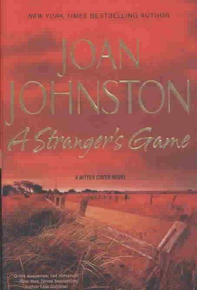 A stranger's game / Joan Johnston.