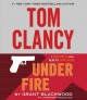 Tom Clancy under fire  Cover Image